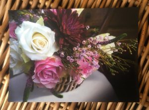 Informal flowers in basket postcard for Bedgebury Blooms